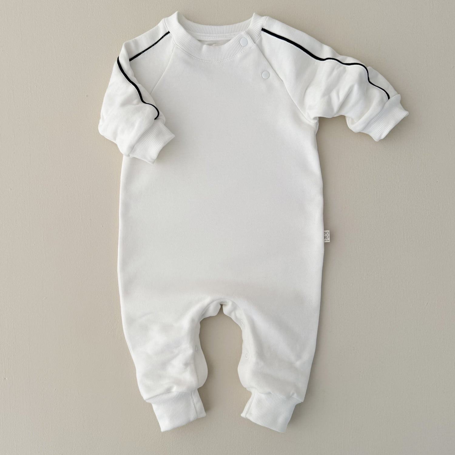 Macacão Bebê Moletom Peluciado Comfy – Off White com Preto
