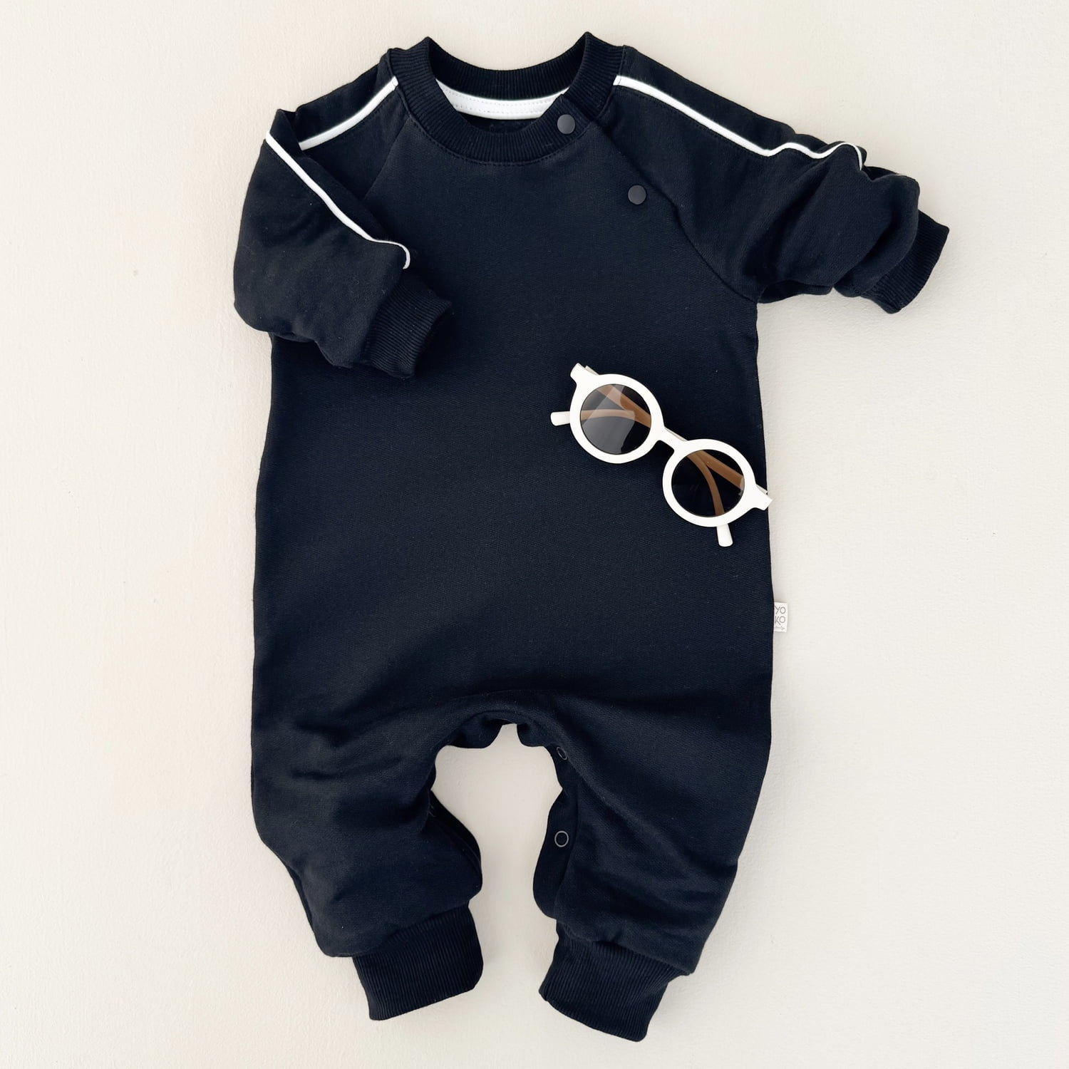Macacão Bebê Moletom Peluciado Comfy – Preto com Off White