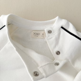 Macacão Bebê Moletom Peluciado Comfy – Off White com Preto