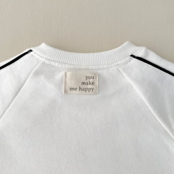 Macacão Bebê Moletom Peluciado Comfy – Off White com Preto